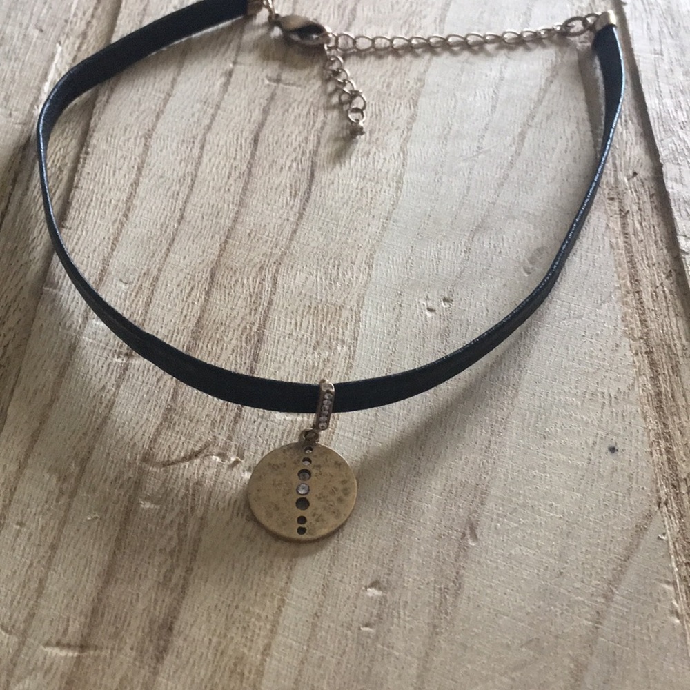 Adjustable black leather choker with gold charm